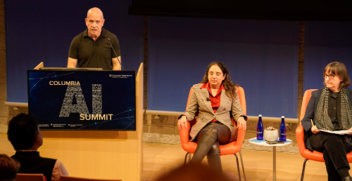 Mark Hansen delivers remarks during "AI and Creativity" at the 2025 Columbia AI Summit. Man stands at a podium that reads "Columbia AI Summit."