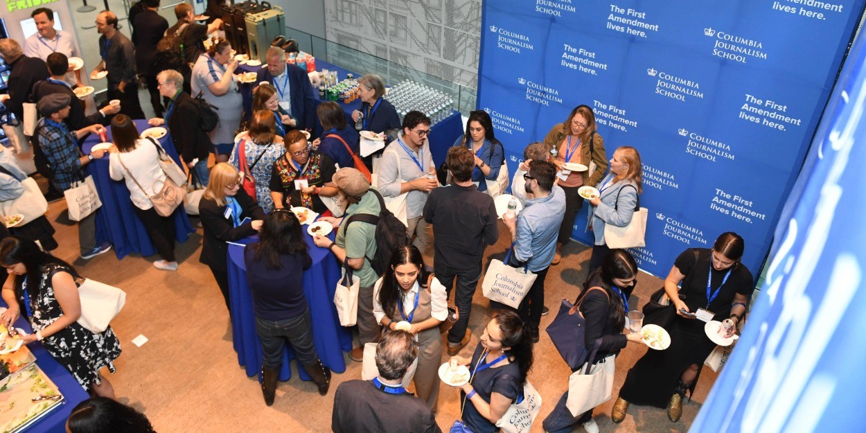 A group of alumni mingle during a social event. 
