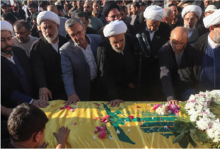 Mourners on July 31 bid farewell to civilians killed in an Israeli strike the day before, which Hezbollah said killed one of its senior commanders. Photo credit: Reuters) Image