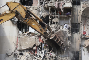 A view of a damaged building at the site of Friday's Israeli strike, as search and rescue operations continue, in Beirut's southern suburbs, Lebanon September 21, 2024. Photo credit: REUTERS/Amr Abdallah Dalsh Photo of destroyed building