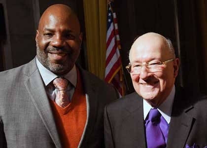 Dean & Henry R. Luce Professor of Journalism Jelani Cobb with Ira A. Lipman photo of Jelani Cobb and Ira A. Lipman