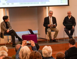 From left to right: Alisa Solomon, David Hajdu and Ahmed Elgammal engage in a discussion about AI's influence on art and culture. Not pictured: George Lewis. Panelists on a stage in conversation.