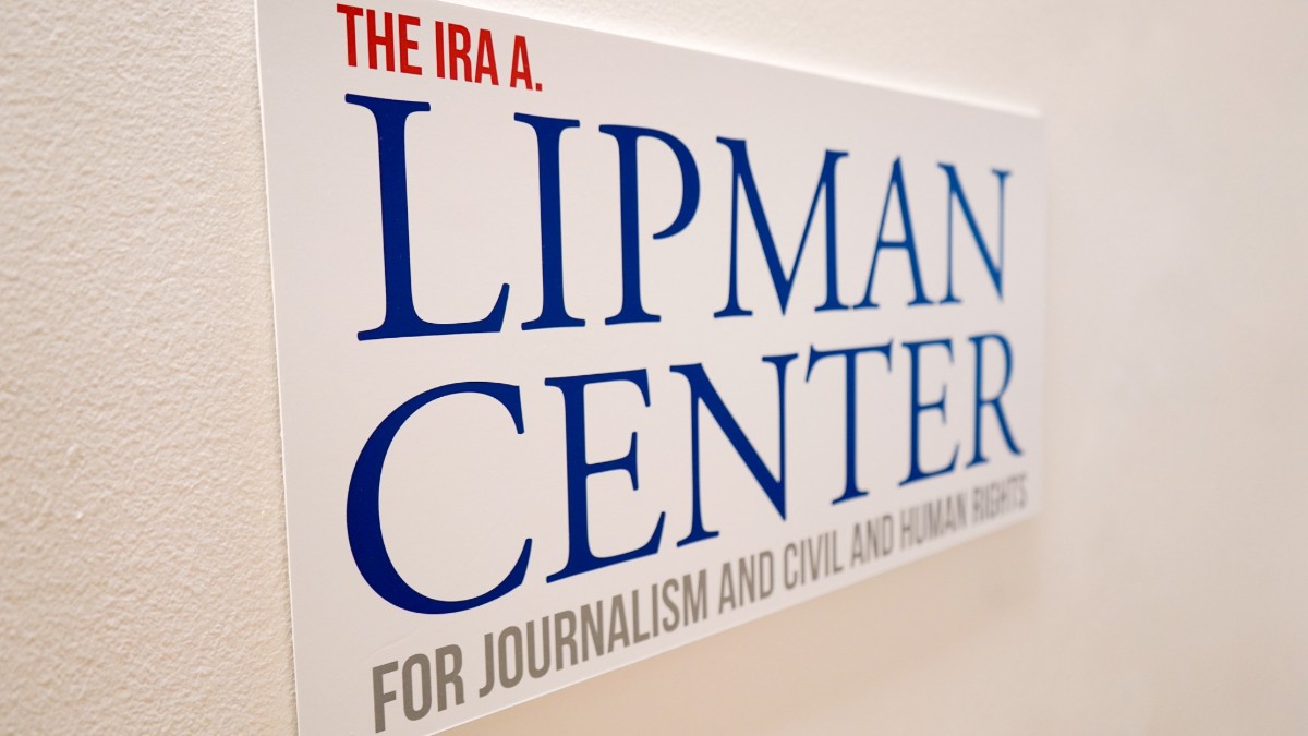 Sign on a wall that reads "The Ira A. Lipman Center for Journalism and Civil and Human Rights."