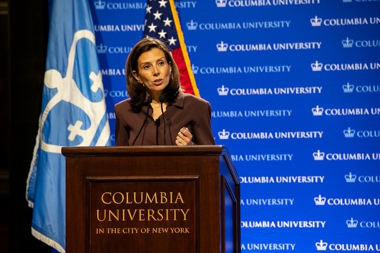 Columbia's Interim President Katrina Armstrong gives opening remarks at the event in Low Library. Photo credit: Cole Giordano Woman at podium