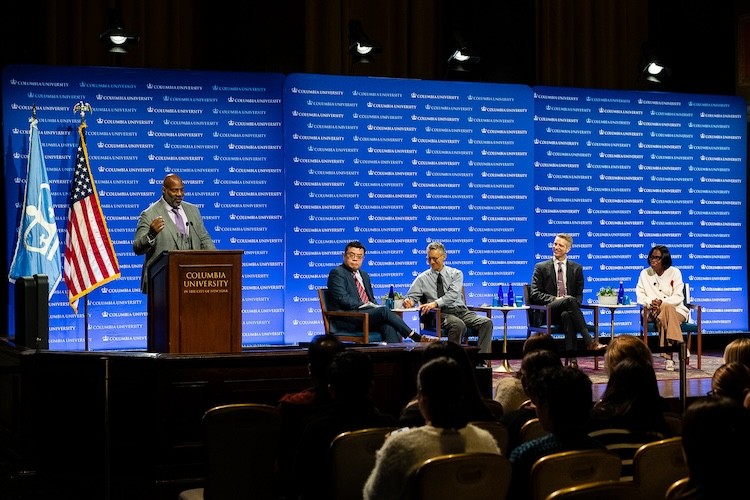 The panel listens to Dean Jelani Cobb's closing remarks. Photo credit: Cole Giordano Panel