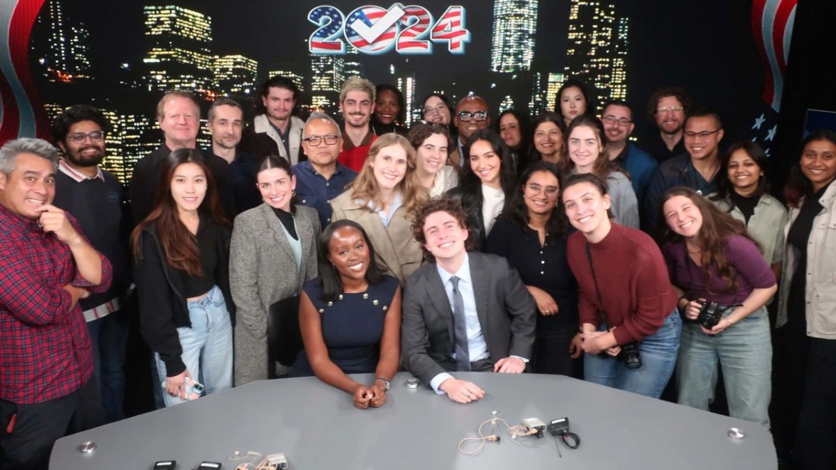 A group of students in the Pulitzer Hall broadcast studio. 