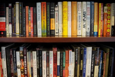 Bookshelf with faculty publications. 