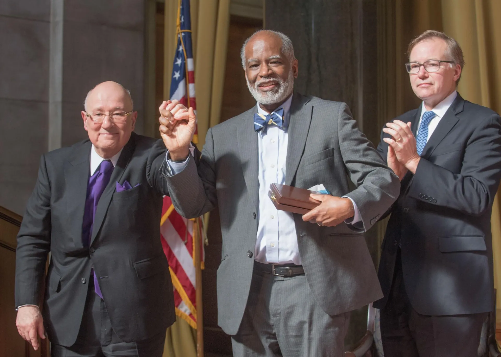 Mr. Lipman with Gwen Ifill's brother, Bert Ifill and Dean Steve Coll in 2017