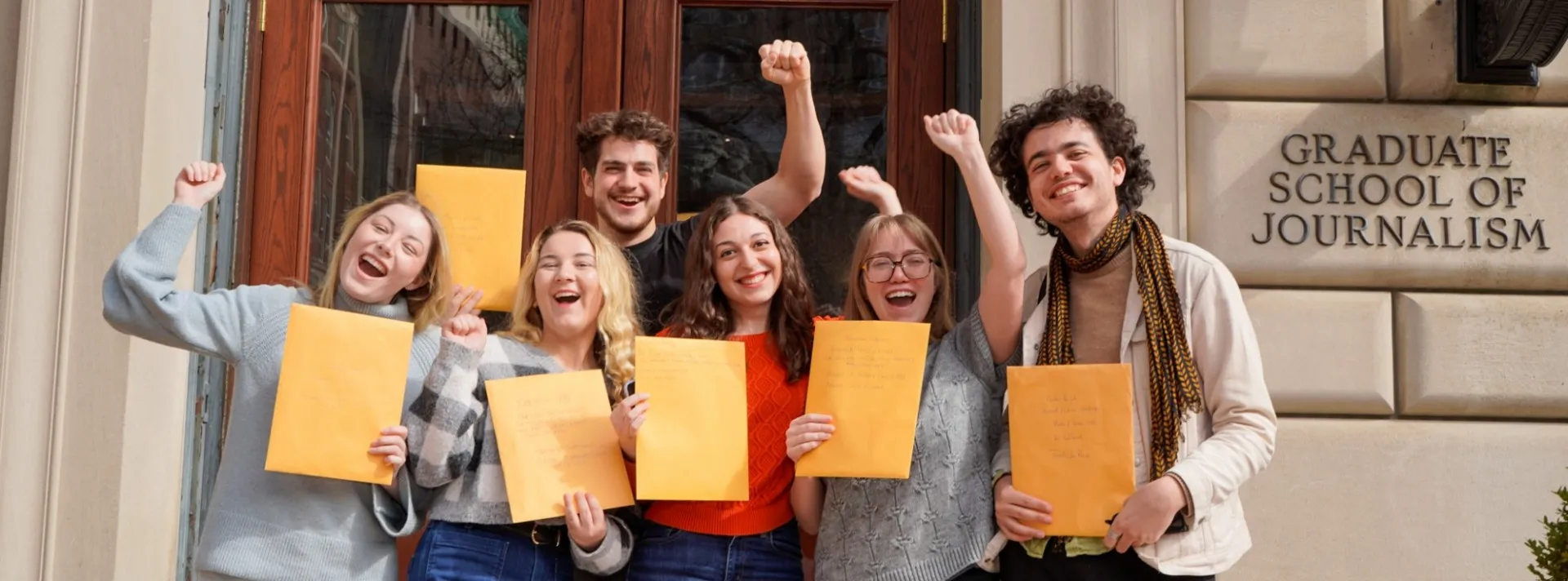 M.S. students celebrate submitting their master's theses.