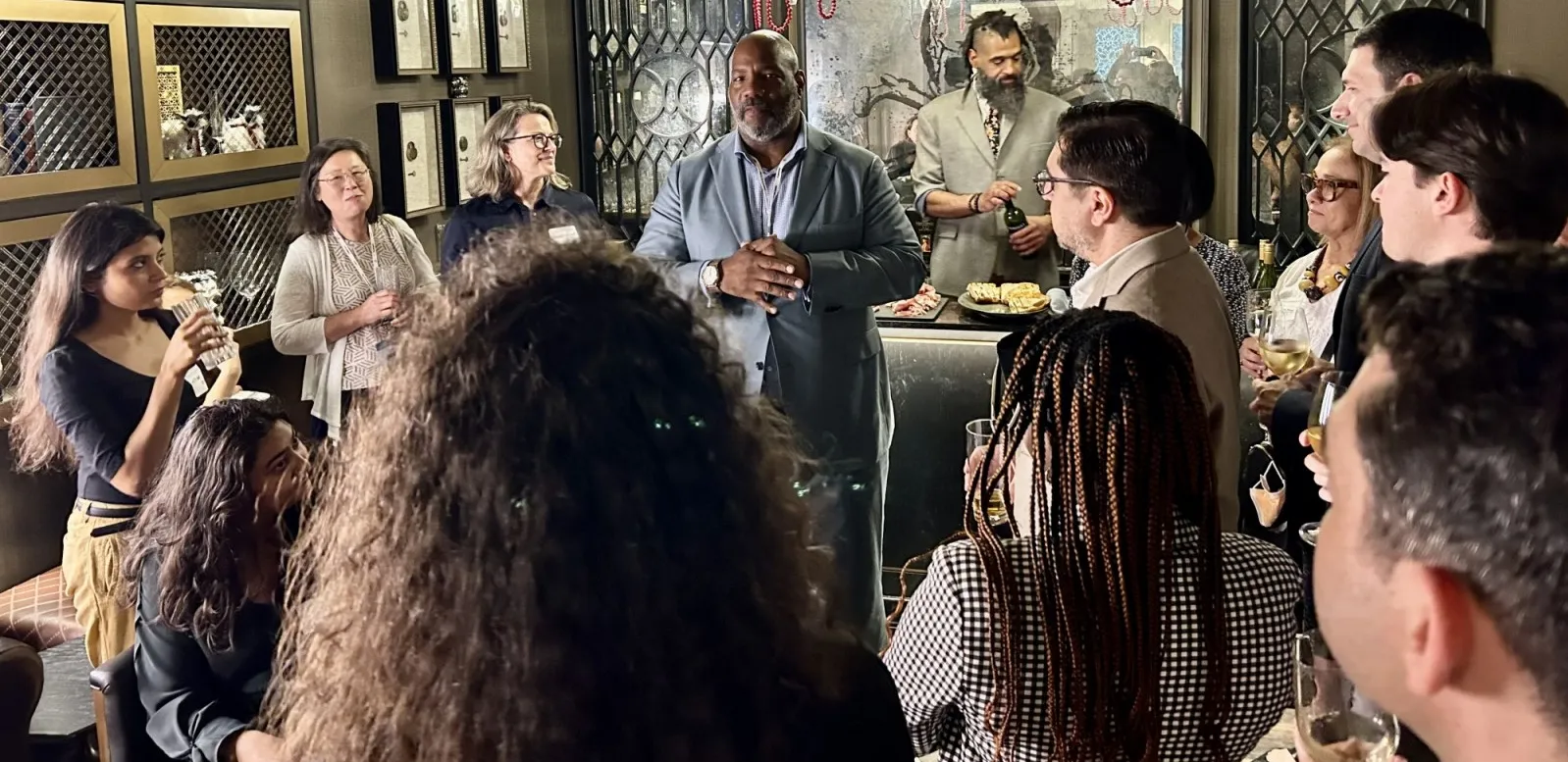 Dean Jelani Cobb Speaking to alumni at an alumni reception event.