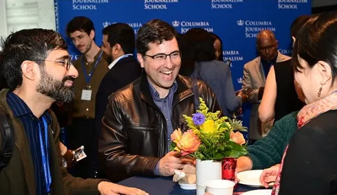 Alumni socializing at an alumni weekend event. 