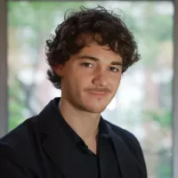Headshot of Chris Caurla, ’25 M.A. Politics.