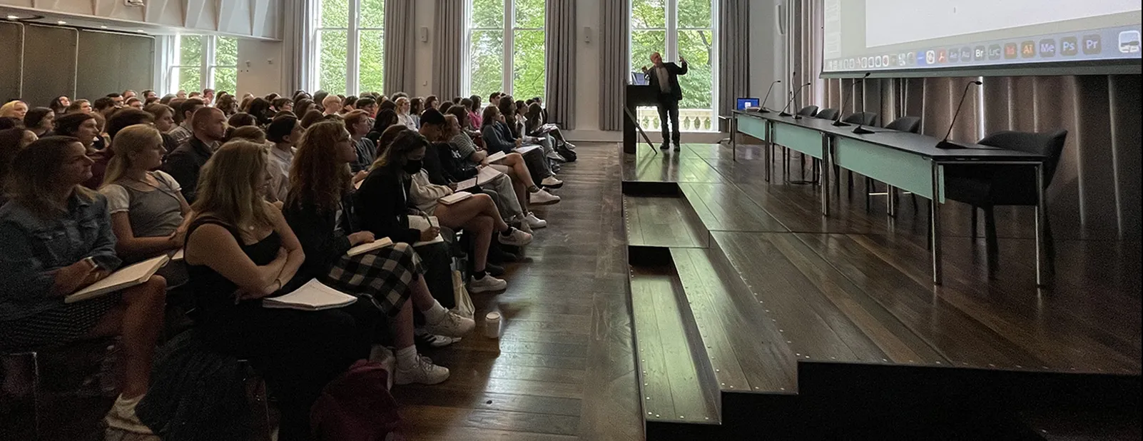 Students listening to a speaker in Pulitzer Hall