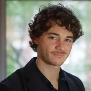 Headshot of Chris Caurla, ‘25 M.A. Politics