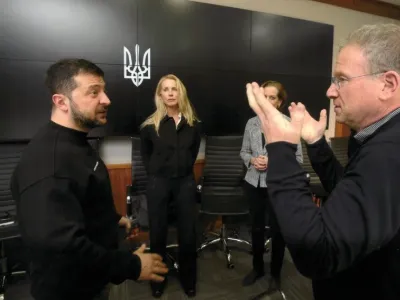Ukrainian President Volodymyr Zelenskyy speaks to Jeffrey Goldberg as Laurene Powell Jobs and Anne Applebaum look on in March 2023. Photography by Alexander Chekmenev for The Atlantic.
