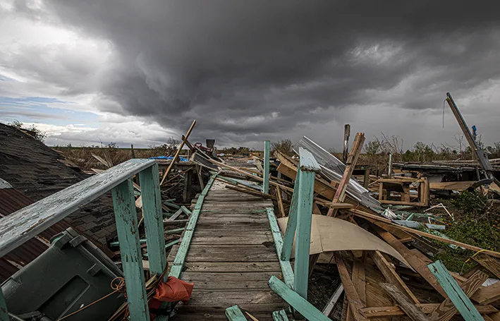Some residents are resistant to admit that the last days of Isle de Jean Charles have arrived. But environmental devastation has taken a toll on the fragile landscape and the people of Jean Charles Choctaw Nation (Photo by: Ted Jackson)