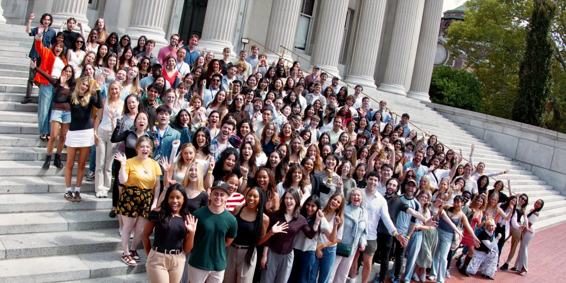 Columbia Journalism Class of 2026 students on the steps of Low Library.