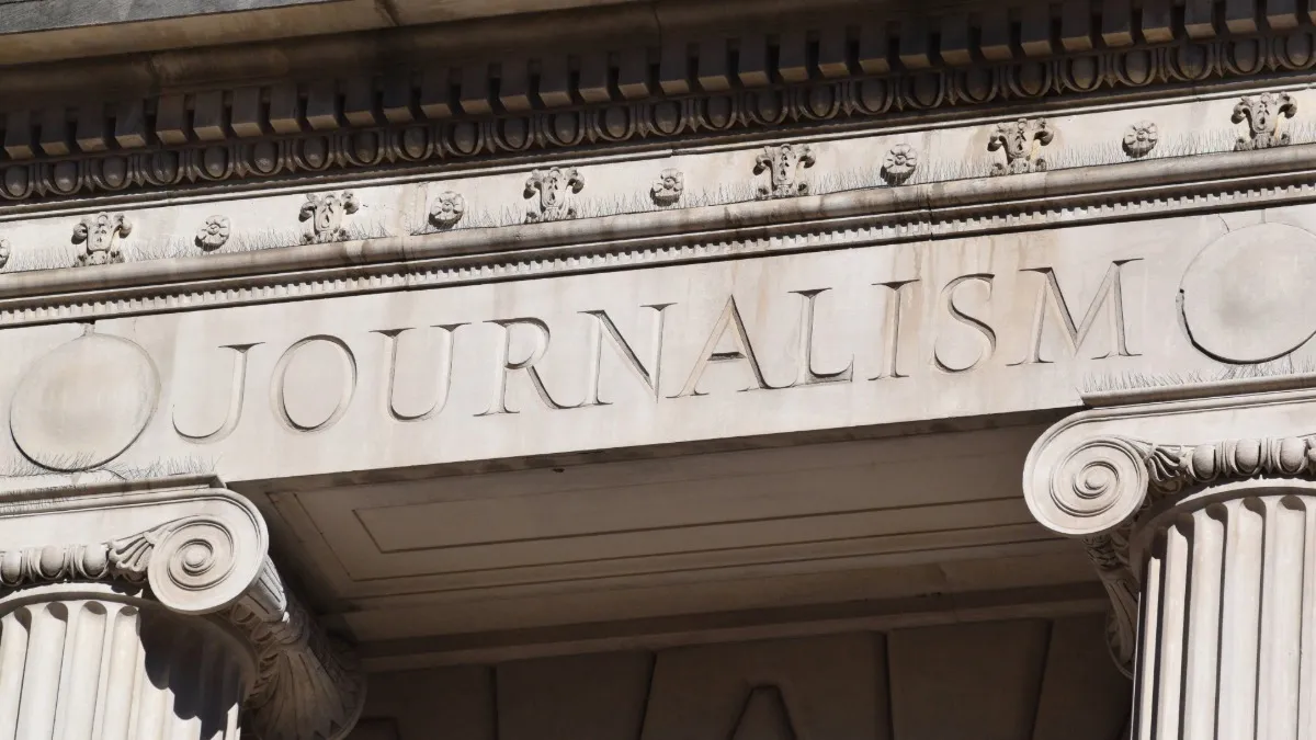 Front of Pulitzer Hall that reads "Journalism."