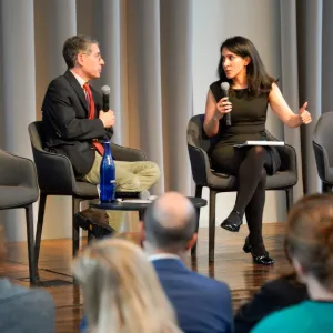 A two-person panel in discussion. 