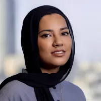Headshot of Aisha Gani. 