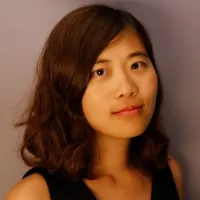 Headshot of Helu Wang. 