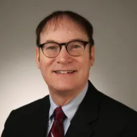 Headshot of James Madore, '88 M.S.