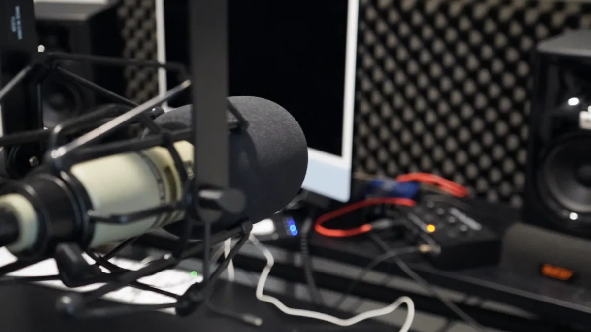 Microphone set up in an audio booth. 
