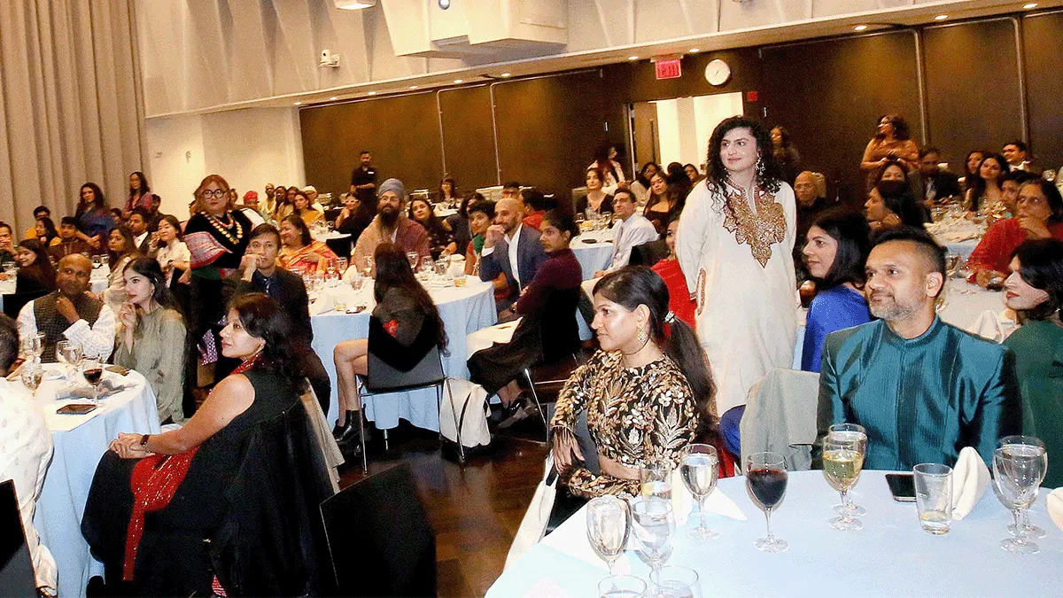 Columbia Journalism School alumni, faculty, staff and students attend the SAJA Awards Ceremony in the Lecture Hall. 