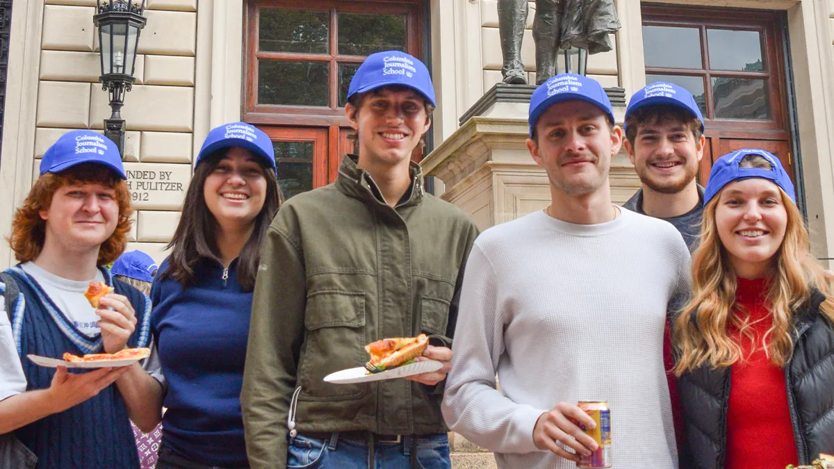 Journalism students outside Pulitzer Hall during Columbia Giving Day celebrations. Dana Binfet, ‘25 M.S. (Photographed far right), was published in Culturebot during the fall semester. 