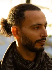Headshot of Karim Zidan. 
