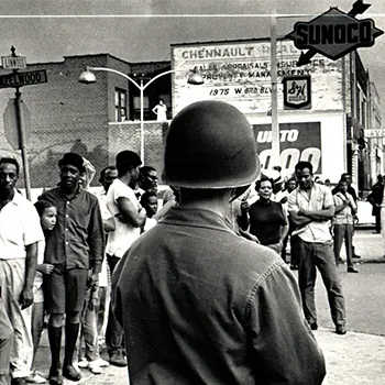 Black and White photo from The Riot Report.
