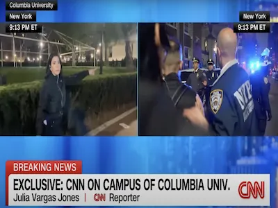 Columbia Journalism student Julia Vargas Jones reports live on CNN. 