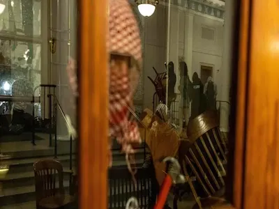 Protester inside Hamilton Hall at Columbia. 