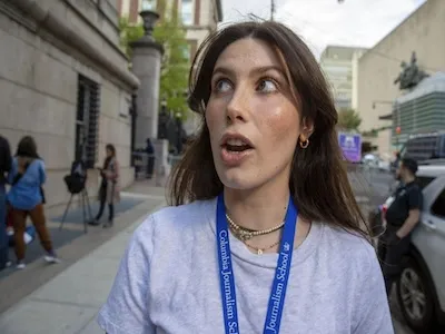 Cecilia Blotto, '24 M.S., is photographed by AP during an interview and the photo is shared by Chronicle Telegram on Columbia protest coverage. Photo by AP Ted Shaffrey.