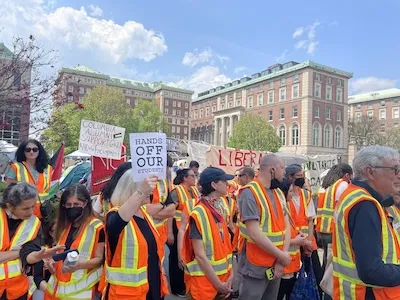 Columbia faculty and staff in orange vests. Photograph by Claire Davenport.