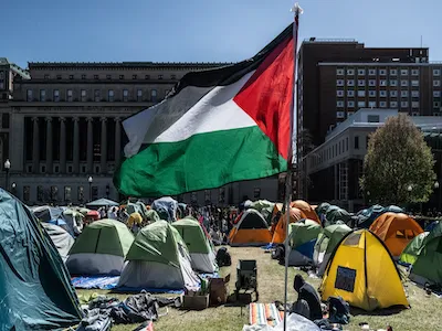 Photo of students gathered to protest on Columbia's campus. 