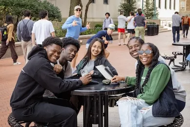 Students gather outside Learner Hall on Columbia's campus