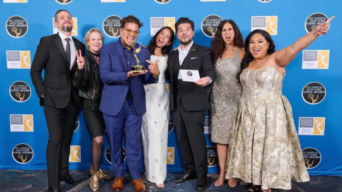 Gabriella Canal, ’21 M.S. Documentary, (center) at the 69th New York Emmy Awards with the team behind “From Times Square to the World,” the series she wrote and directed for New York City Tourism + Conventions. Jonathan Durbin, ‘99 M.S., served as the series’ executive producer. Credit: Gabriella Canal, ’21 M.S. Documentary.