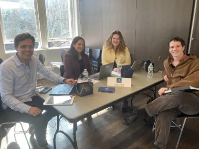 Employers from Law360 interact with a member of the Class of 2026. 