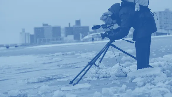 Student filming in Coney Island. 