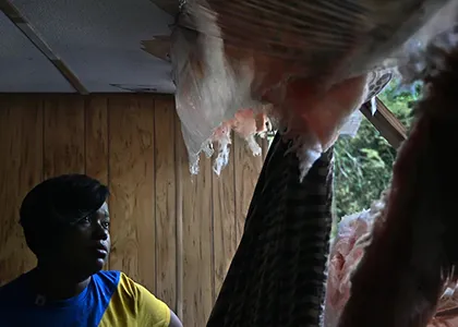 Briana Bouyer, seen at her damaged home in Greensboro, which was hit by the tornado in March, was denied FEMA disaster relief because she could not prove she owned her property. Photo: Michael S. Williamson for The Washington Post