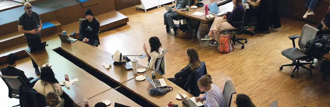 Top-down view of a gathering at the Brown Institute for Media Innovation. 