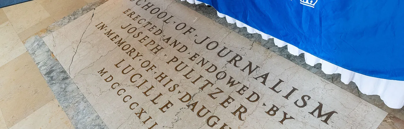 stone inscription about the founding of Columbia Journalism School